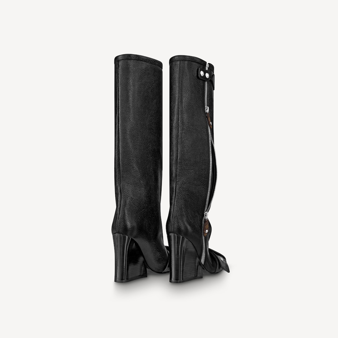 Fashion Bomb Daily - One of the hottest boot designs of the season by @ louisvuitton . These Patti Wedge high boots featuring zip and popper  details and LV monogram accents. Priced at