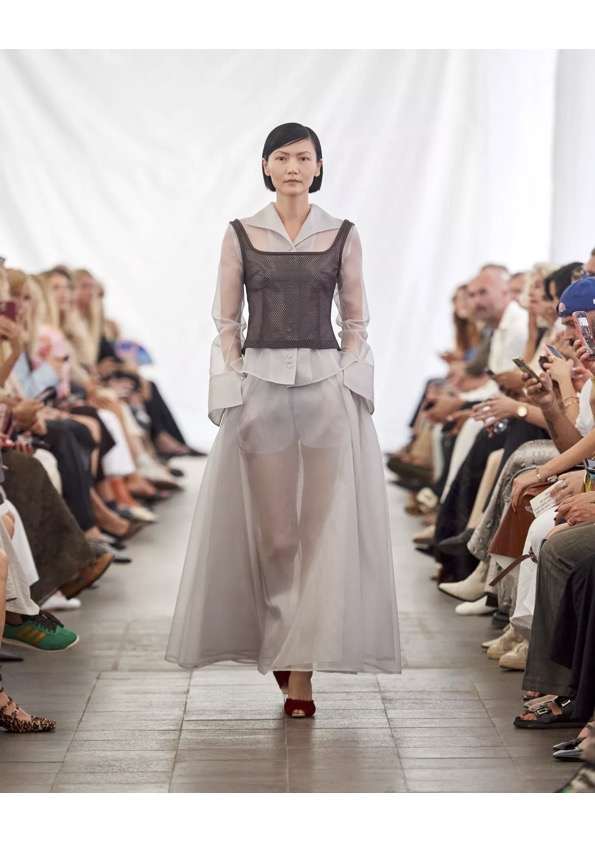 7-trends-to-know-from-copenhagen-fashion-week-ss25-tamara-kalinic-sheer-dressing-shirt-and-skirt